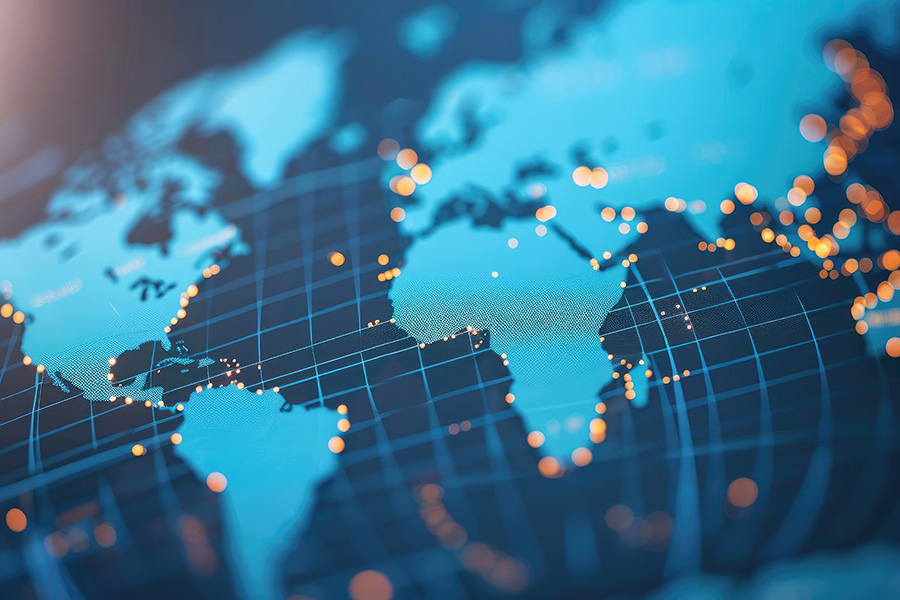 A world map with a blue background features glowing orange dots scattered across continents, suggesting connectivity or data points, overlaid with a grid pattern.